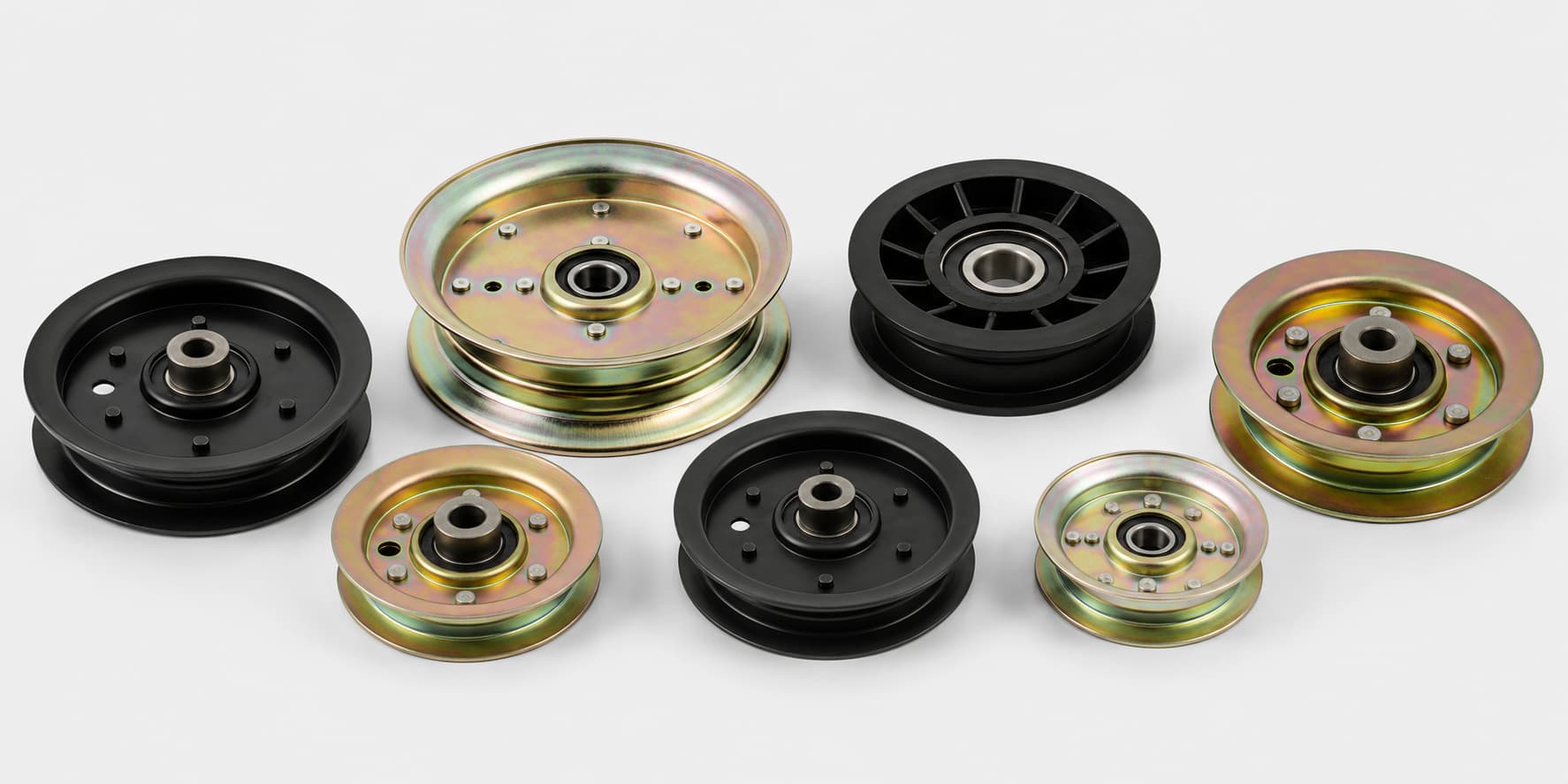 Deck pulleys and idler pulleys collection banner showing replacement mower deck pulleys for riding mowers, zero-turn mowers, and lawn tractor deck repair.