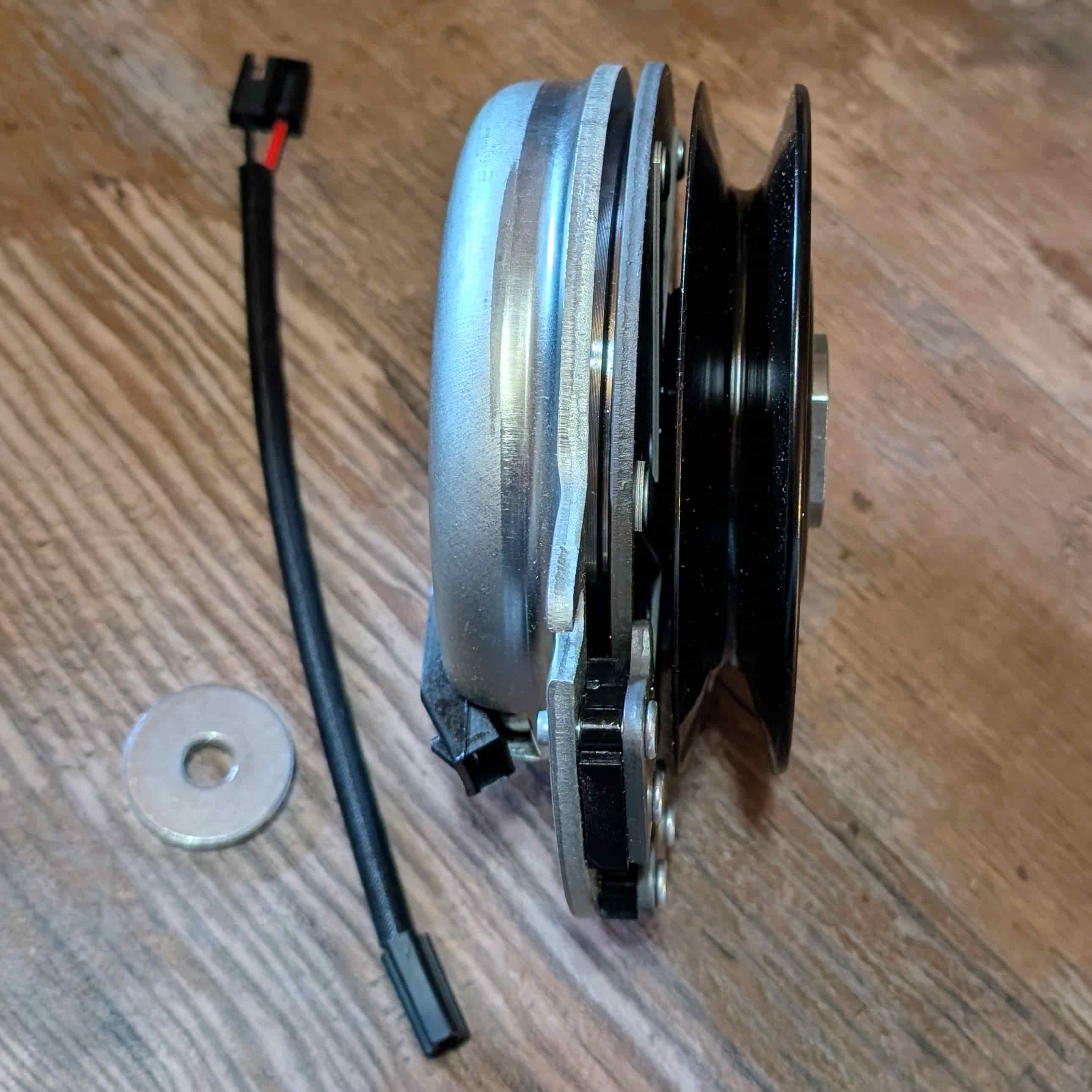 Side view showing height and internal components of PTO clutch 2721337 for Bobcat mowers.