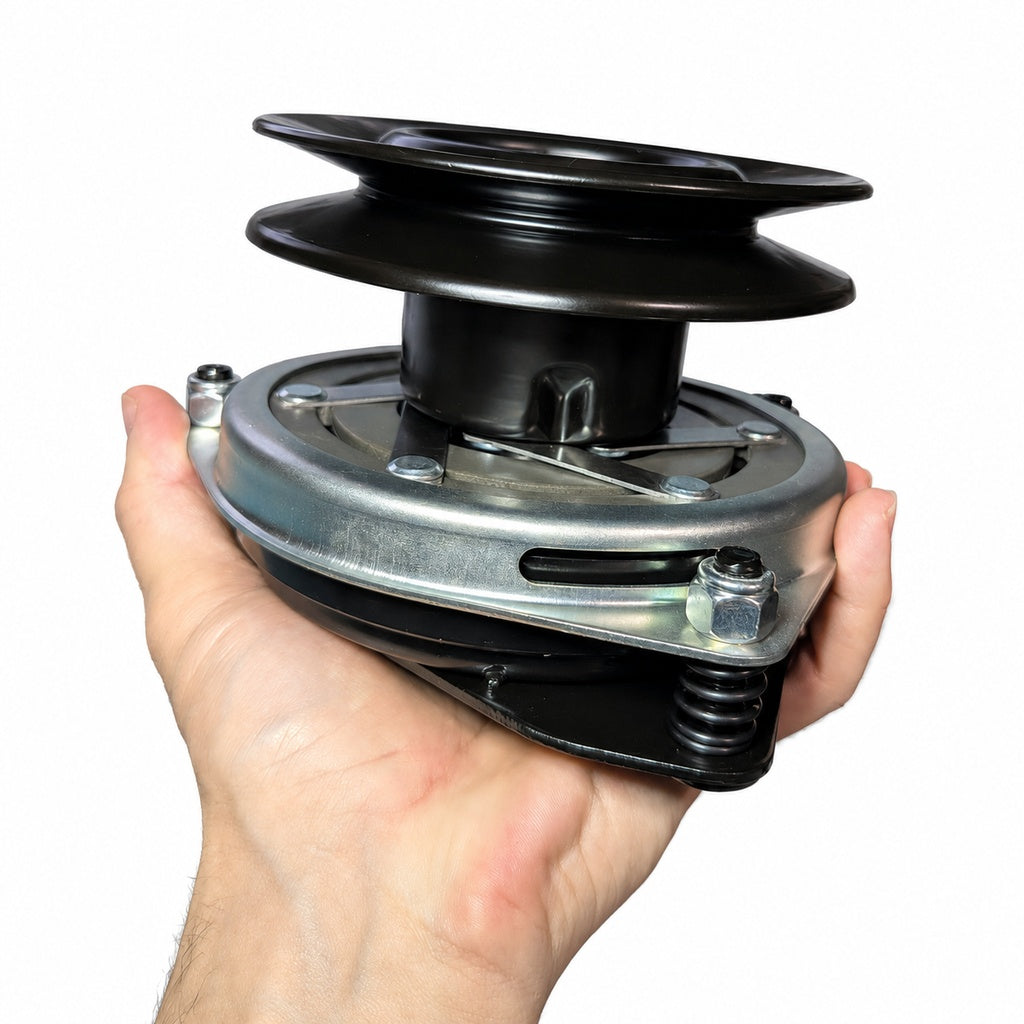 Hand holding a PTO clutch that fits John Deere model 345 and more.