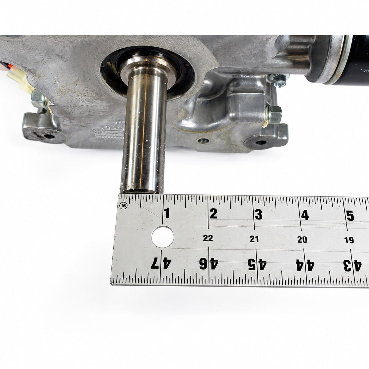 engines-kohler-kt740-3097-shaft.jpg	Kohler KT740-3097 vertical crankshaft with ruler showing shaft diameter
