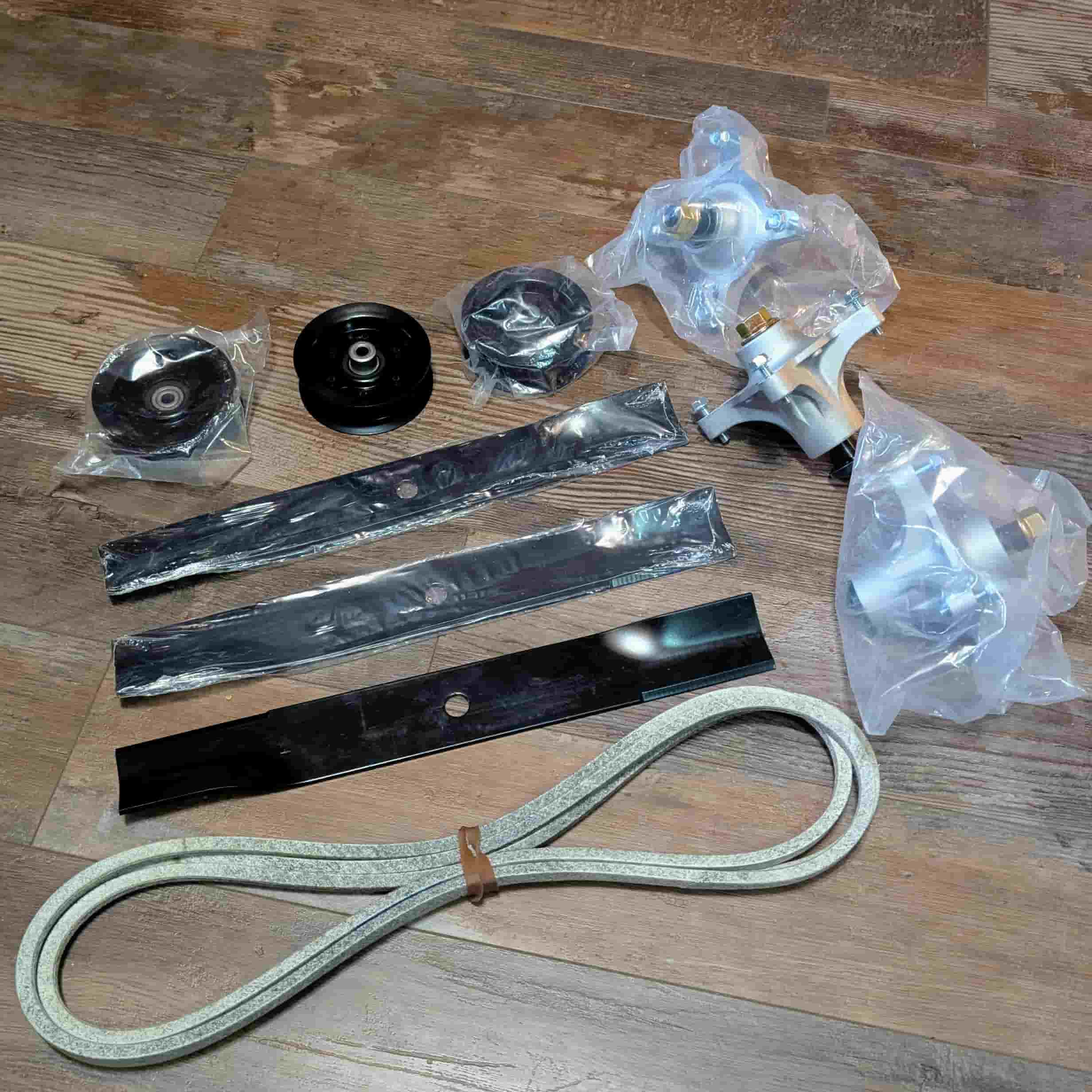 Real photo of the full deck rebuild kit for Toro Timecutter.