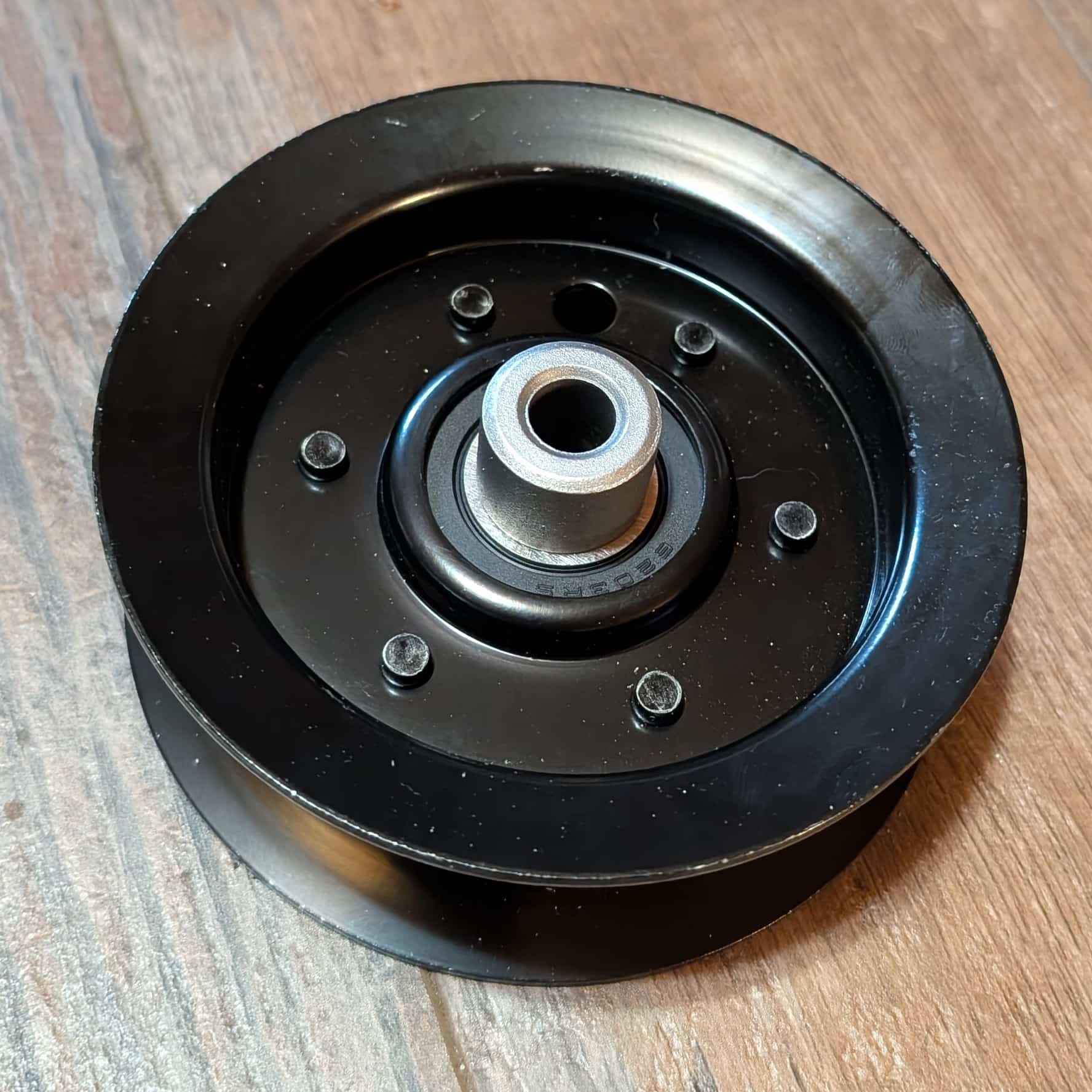 Flip side of idler pulley 106-2175 as part of complete deck kit for Toro.
