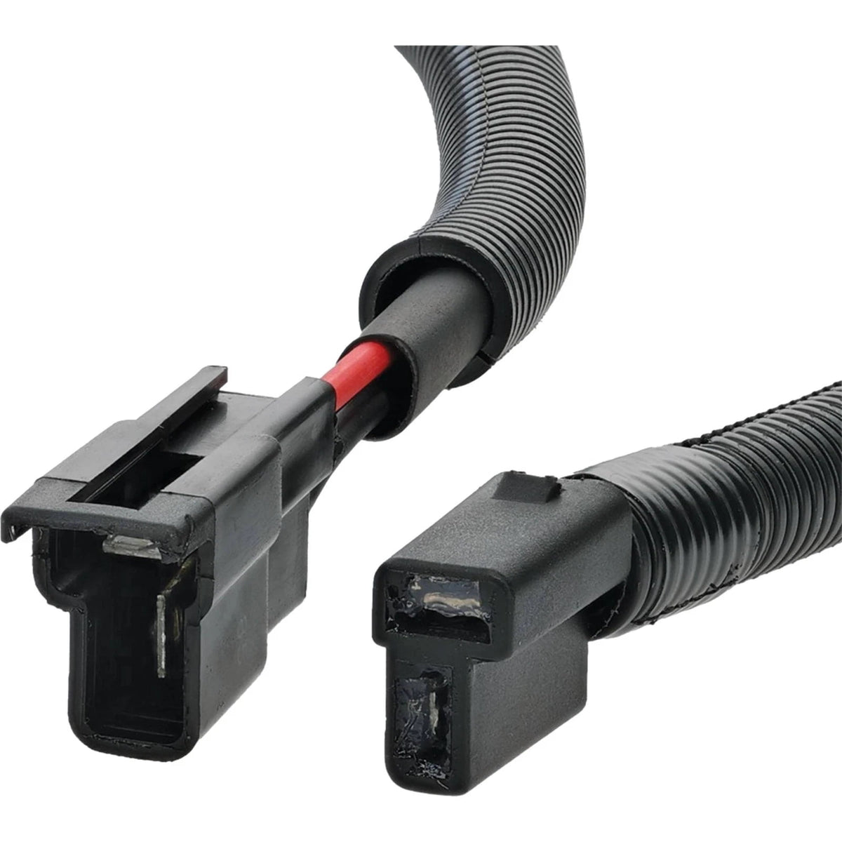 Close-up of Xtreme PTO clutch T-plug connectors showing terminal orientation and protective wire loom